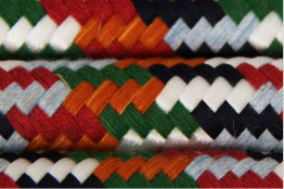 Firm round braided rope in assorted bright colours, made from natural fibres. Popular for pet toys, decorative projects, and general-purpose use where vibrant, economical rope is needed.