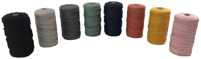 Assorted rolls of soft macramé cotton twine in rich colours, including beige, black, blush pink, dark grey, light grey, mustard, navy blue, pale blue, sage green, and terracotta - perfect for crafts, décor, and DIY projects.