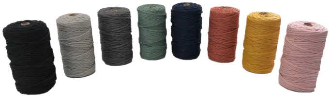 Assorted rolls of soft macramé cotton twine in rich colours, including beige, black, blush pink, dark grey, light grey, mustard, navy blue, pale blue, sage green, and terracotta - perfect for crafts, décor, and DIY projects.