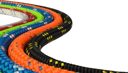 A vibrant dynamic rope coiled for display, featuring a kernmantle construction with a nylon core and braided sheath. Designed for climbing, fall arrest, and lead protection, this rope offers controlled stretch to absorb impact forces. CE-certified and ideal for sport climbing, mountaineering, and rope rescue scenarios.